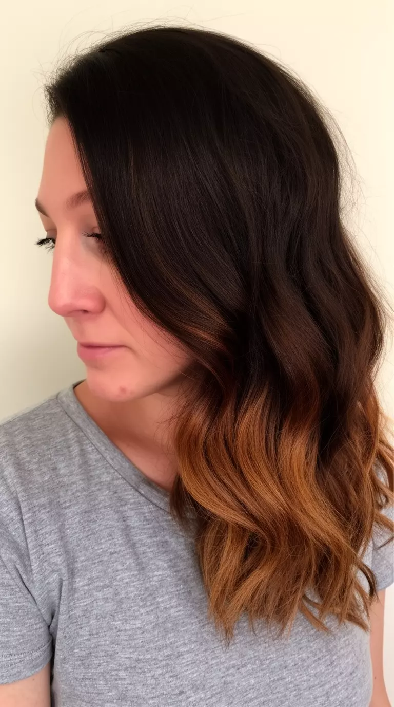 casual close-up photo of a 34-year-old woman wearing a gray top with a dark brown, wavy hair with a subtle, warm brown ombre colored medium-long hairstyle, side view, minimal background