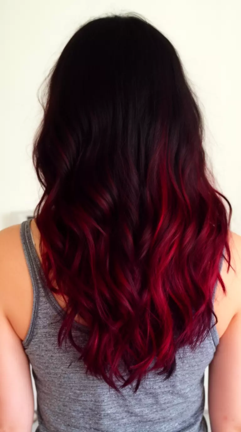 casual close-up photo of a 30-year-old woman wearing a gray tank top with a dark hair with deep red/burgundy highlights colored long, wavy hairstyle, back view, minimal background