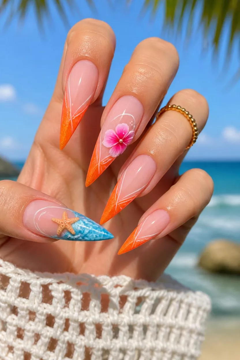 close-up shot of a woman’s hand with five fingers showing nails with long, stiletto nails featuring an orange ombre French tip design with 3D accents of white lines, a bright pink flower, and a textured blue tip with a starfish, bright summer background.