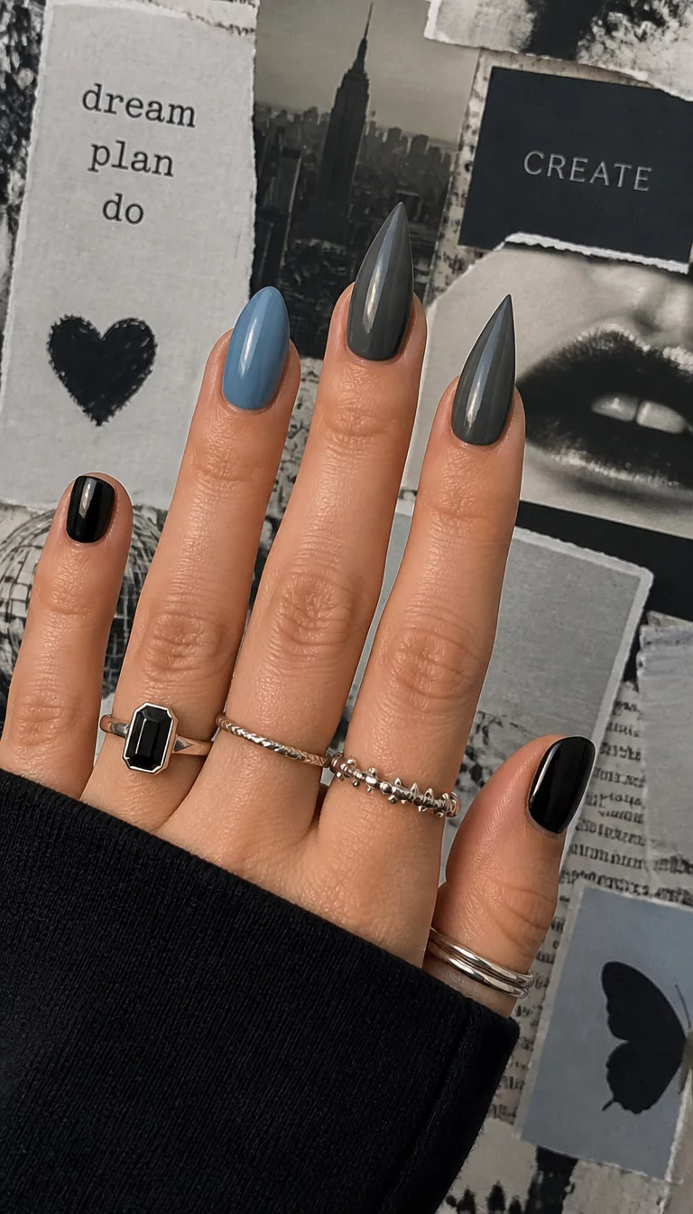 Moodier Neutral Tones close-up shot of a woman’s hand with five fingers showing nails with almond nails in muted blue, sharply pointed dark grey stiletto nails, and short glossy black nails, collage background.