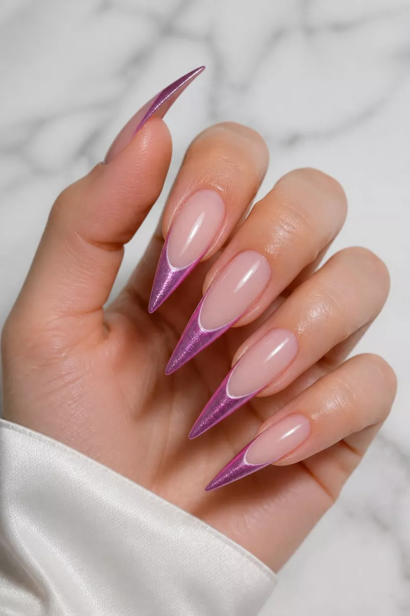 close-up shot of a woman’s hand with five fingers showing nails with long sharply pointed stiletto nails with ethereal pink and purple magnetic cat-eye French tips, sheer base.